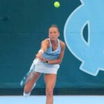 No. 21 Tatum Evans (UNC-CH) serves in her match versus No. 48 Katie Rolls (Virginia) at the Kitty Harrison Invitational Sept. 13, 2026.