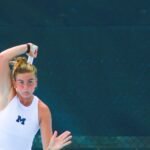 Piper Charney hits ball at Kitty Harrison Invitational