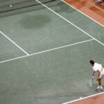 Andres Santamarta Roig serves during NCAA Team Quarterfinals match.